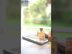 Embalaje de botellas de perfume de vidrio con logotipo y cierre de plástico