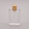 botella de perfume de cristal plana 50ml con el pequeño casquillo del oro