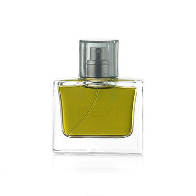 Embalaje de botellas de perfume de vidrio con logotipo y cierre de plástico